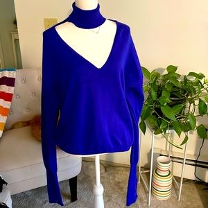 Blue Cyrus brand blue V neck